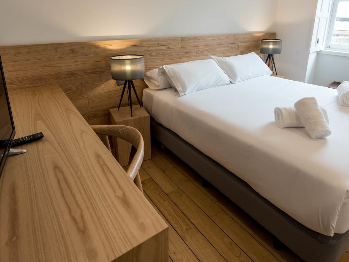 Bluesock Hostels Oporto Exterior foto A room at the hotel